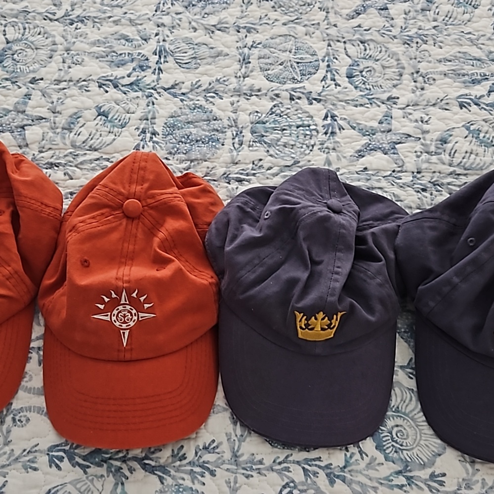 4 hats from crystal cruise & Ama never used.unisex hats